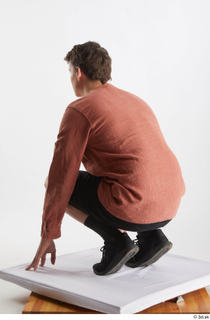  Brett  1 black jeans shorts black sneakers casual dressed kneeling orange linen shirt whole body 0004.jpg